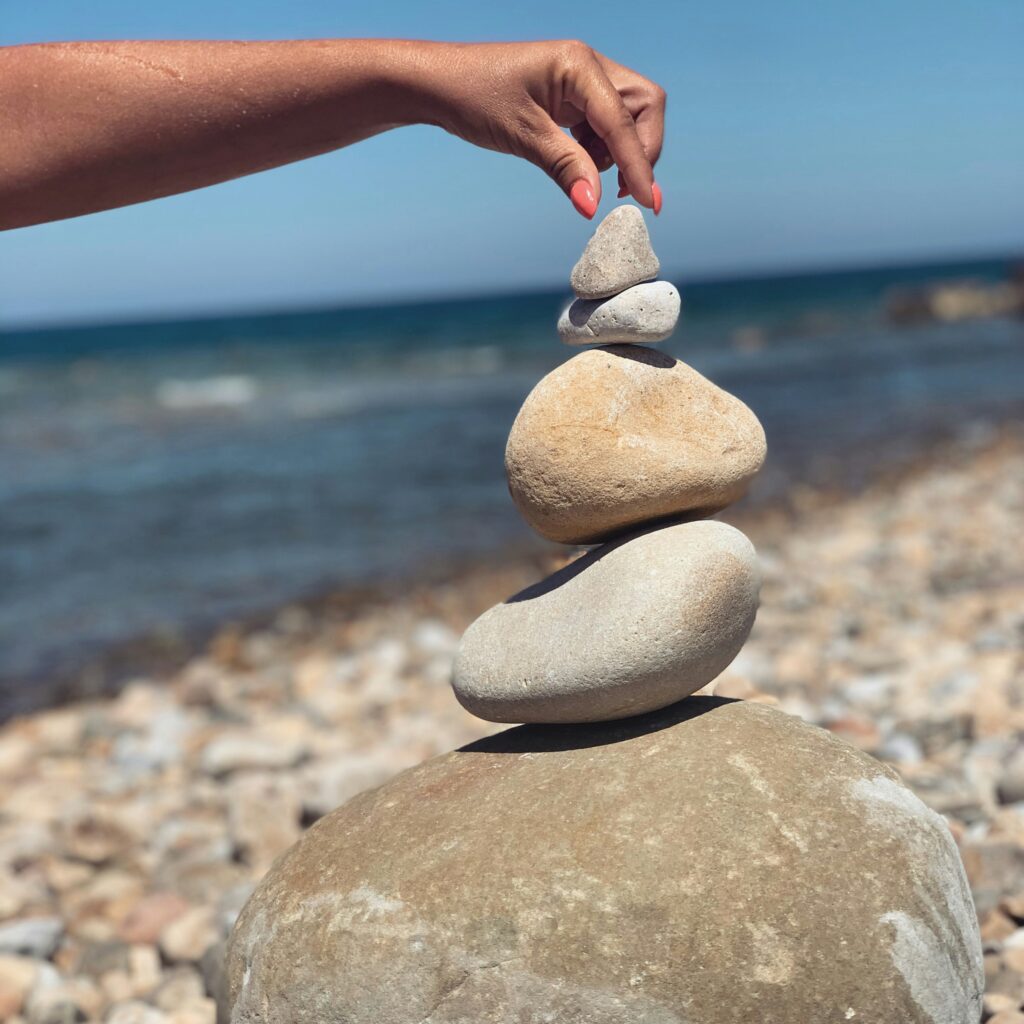A stack of pebbles arranged together, showing moringa's role in supporting gut barrier function and intestinal health